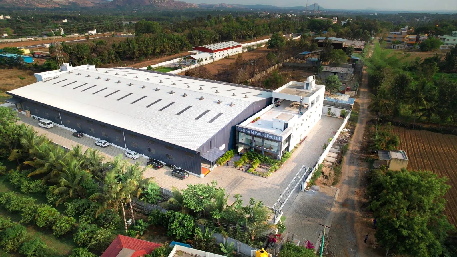 Aerial view of the Creative M Portals factory and office near Bengaluru
